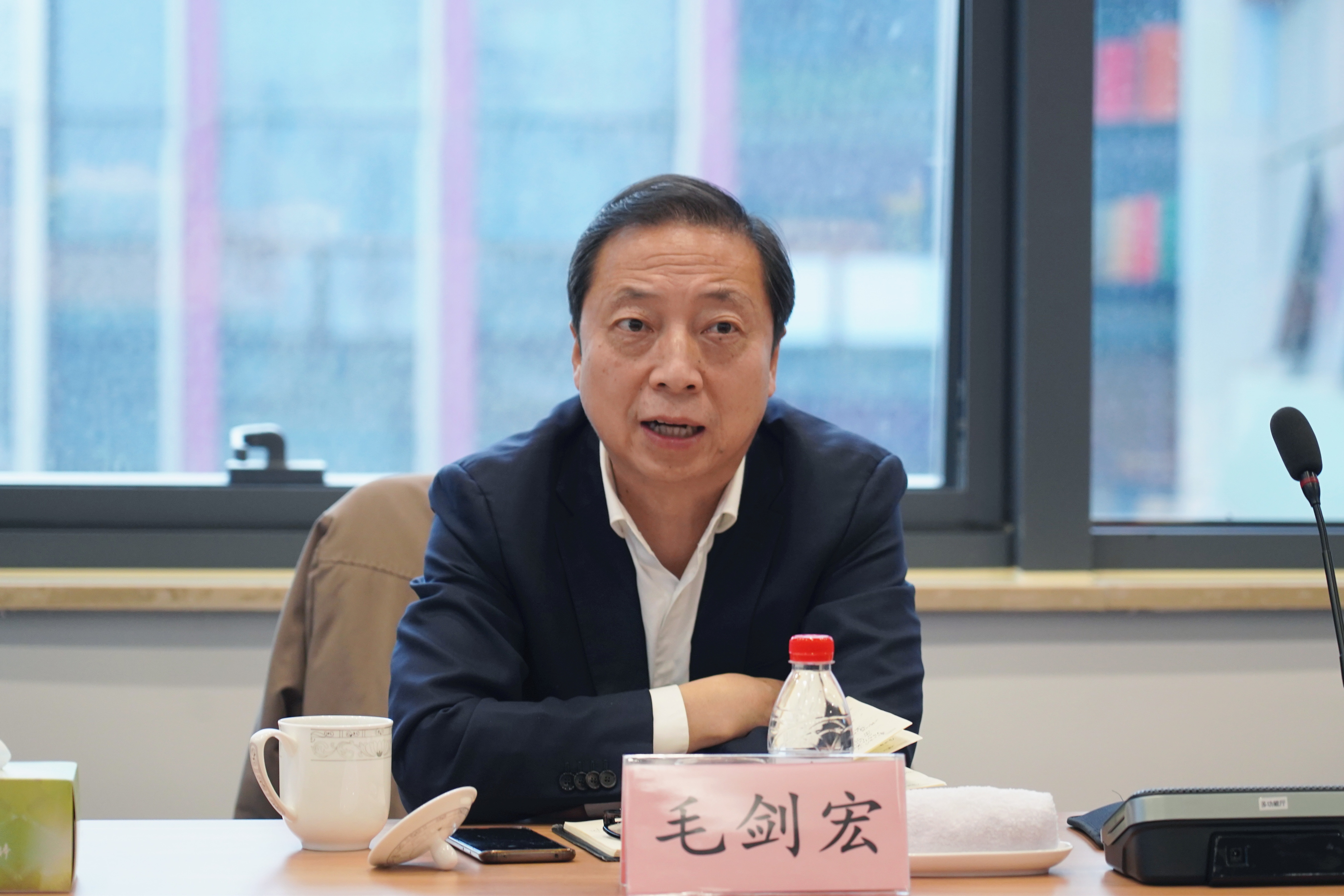 毛董在易港通公司调研.jpg